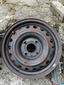 2 x steel rims 15", 4 stud, about 114mm ish from hole centre to the opposite home centre... Possibly fit a nissan etc