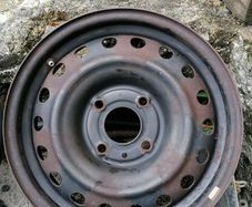 2 x steel rims 15", 4 stud, about 114mm ish from hole centre to the opposite home centre... Possibly fit a nissan etc