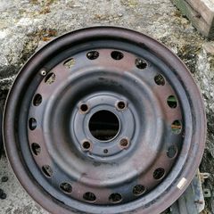 2 x steel rims 15", 4 stud, about 114mm ish from hole centre to the opposite home centre... Possibly fit a nissan etc