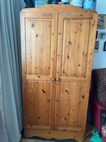 Wardrobe with bookshelf inside