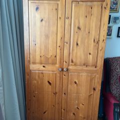 Wardrobe with bookshelf inside