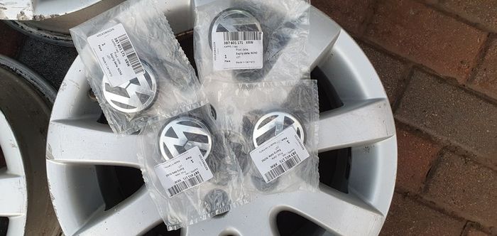 Genuine VW 15 inch alloys with new centre caps