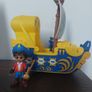 Santiago with pirate ship toy Image 2