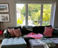L shaped couch - good condition but sun faded