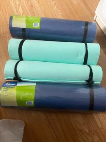 camping mats, 2 brand new, and 1 slightly used.