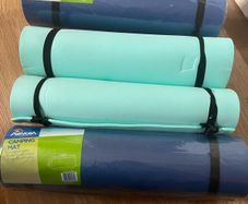camping mats, 2 brand new, and 1 slightly used.
