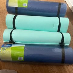 camping mats, 2 brand new, and 1 slightly used.