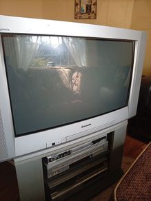 Television set with stand.