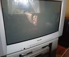 Television set with stand.