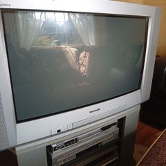 Television set with stand.