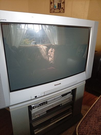 Television set with stand.