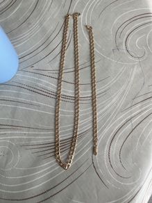 golden neckless and braclet