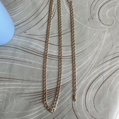 golden neckless and braclet
