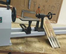 Wood lathe with set of chisels