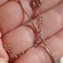 Handcrafted 925 sterling silver necklace with a heart-shaped pendant featuring a floral pattern. Image 8