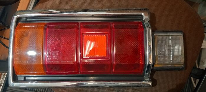 Toyota Carina Rear Left lens unit 1979-82 NOS KOITO 33-05101