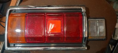 Toyota Carina Rear Left lens unit 1979-82 NOS KOITO 33-05101