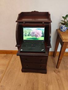 Mahogany cylinder-top writing desk.