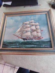 Framed oil of a sailing ship on board signed Y. Jones