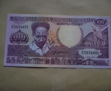 Suriname. Aunc 100 Gulden (1986)