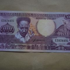 Suriname. Aunc 100 Gulden (1986)