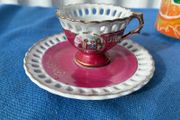 Vintage pierced cup and saucer