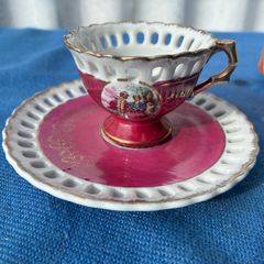 Vintage pierced cup and saucer