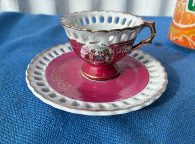 Vintage pierced cup and saucer
