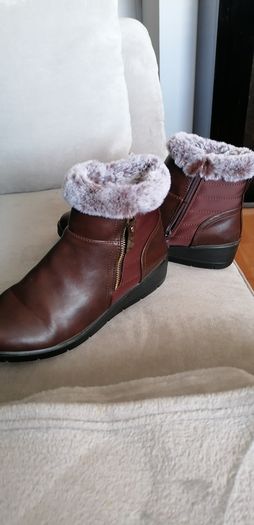 Boots  size 6 and a half  dunnes small tiny mark on one. Worn once