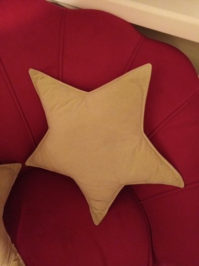 2 cream star shaped velvet cushions
