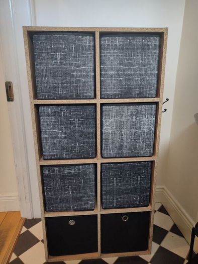 Wooden unit with fabric drawers