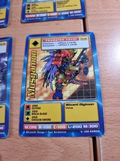 13 Champion level Digimon cards. 1999.