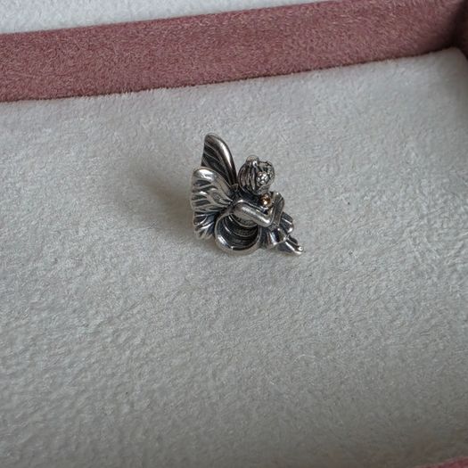 Pandora sitting pixie charm with 14k yellow gold heart  very good condition hallmarked