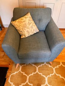Teal upholstered armchairs