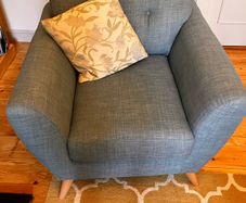 Pair of teal upholstered armchairs