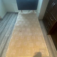 Single bed frame with guest mattress and headboard