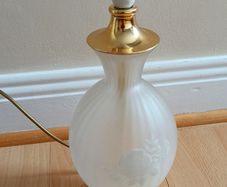 Vintage frosted glass table lamp featuring etched rose motif  height 37cm