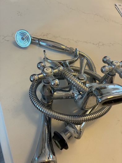 Telephone style bath/shower mixer tap