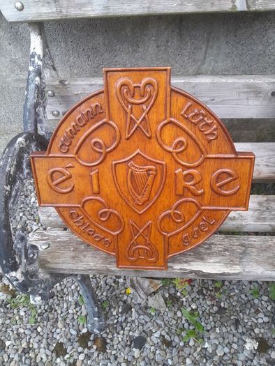 carved g.aa.a shield