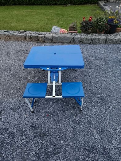 Foldable camping table and chairs