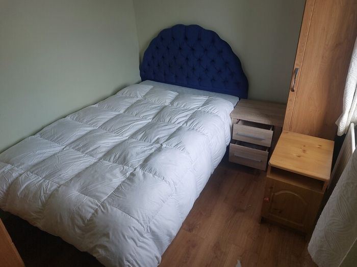Lockers, chest of drawers, bed and small wardrobe