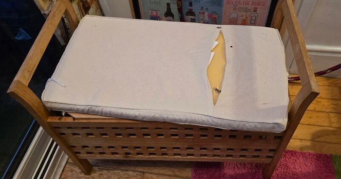 Wooden bench with storage.