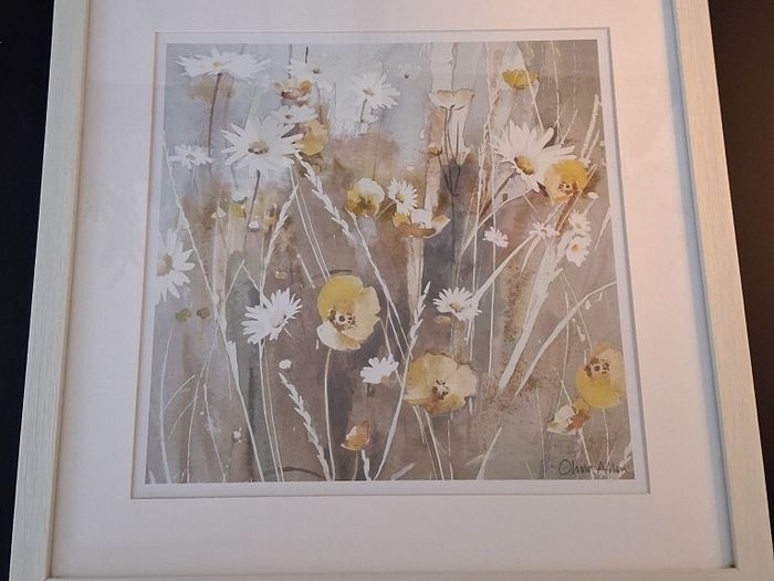 Set of floral pictures in frames