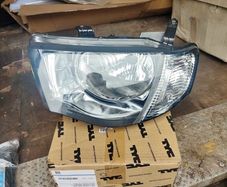 L200 headlight nearside  NEW