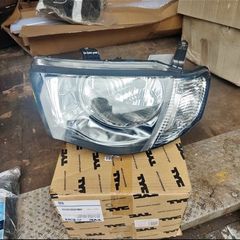 L200 headlight nearside  NEW