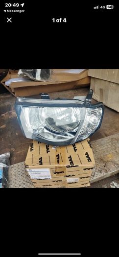 L200 headlight nearside  NEW