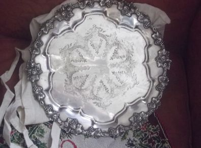 a antique silver plated salver with gadroom border