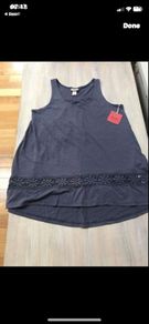 top Bnwt top size 10-12 denim shade with contrast lace/dipped hem