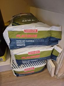 3 bags of Evo-Stik Platinum Rapid-Set Flexible Tile Adhesive White 20kg.