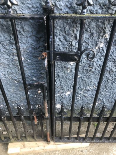 Set of wrought iron driveway gates and side gate